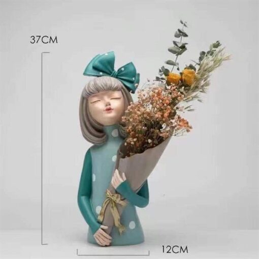Decor tượng cô gái ôm bó hoa màu xanh 1
