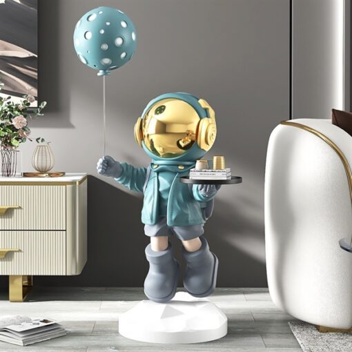 Decor tượng cậu bé phi hành gia màu xanh 1